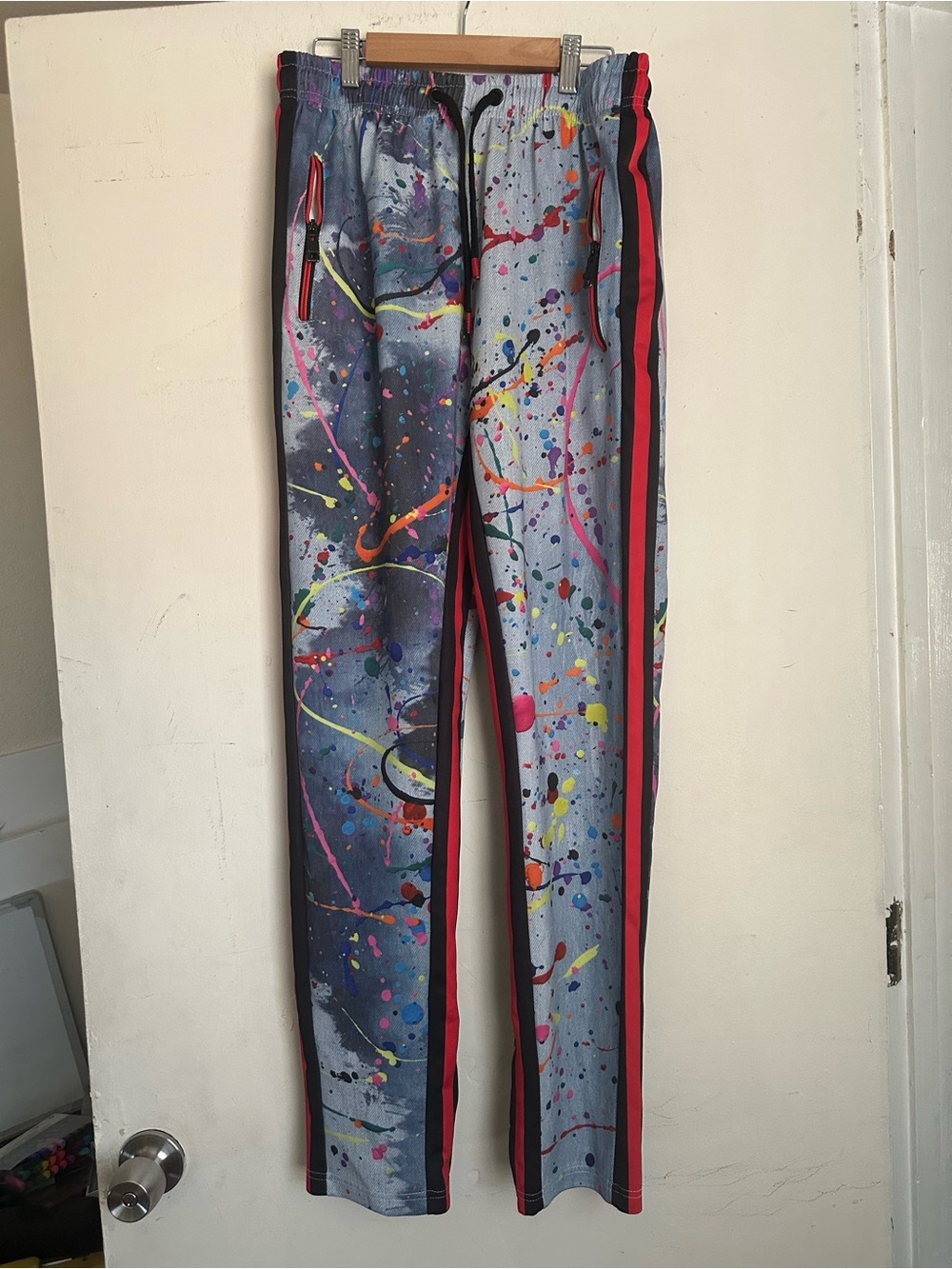 Paint-Splatter Track Pants in Gray with Neon Accents